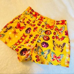 Juniors 7/8 vintage yellow big print shorts